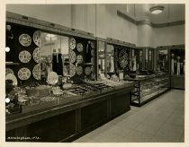 Black and white photograph of interior sales area, taken in October 1937 (p
