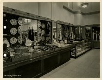 Black and white photograph of interior sales area, taken in October 1937 (p