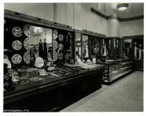 Black and white photograph of interior sales area, taken in October 1937 (p