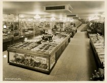 Black and white photograph of interior sales area, taken in October 1937 (p