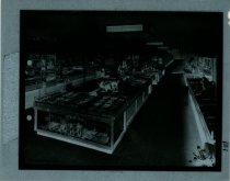 Black and white negative of interior sales area, taken in October 1937 (pho