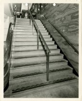 Black and white photograph of interior detail of stair treads, received in