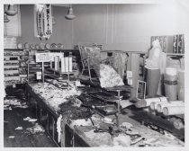 Black and white photograph of interior damage