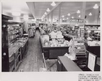 Black and white photograph of sales floor