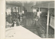 Black and white photograph of interior reconstruction, taken in August 1951