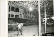 Black and white photograph of interior construction work, taken in June 195