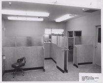 Black and white photograph of back office
