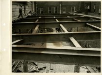 Black and white photograph of roof construction work, taken in April 1951 (