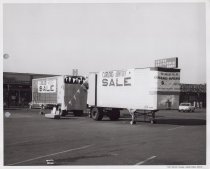 Black and white photograph of sale banners