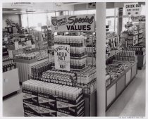 Black and white photograph of Aqua-Net display