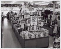 Black and white photograph of bath towels display