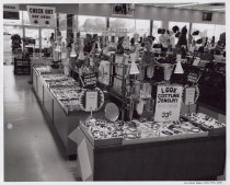 Black and white photograph of costume jewelry display