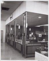 Black and white photograph of dining booths