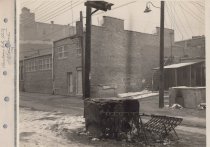 Black and white photograph of back alley