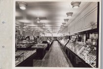 Black and white photograph of sales floor
