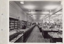 Black and white photograph of sales floor