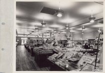 Black and white photograph of sales floor
