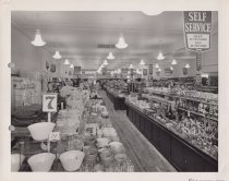 Black and white photograph of sales floor