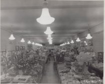 Black and white photograph of sales floor