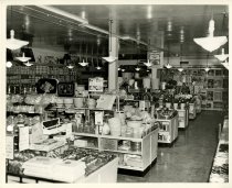 Black and white photograph of interior sales area basement, taken in 1960 (