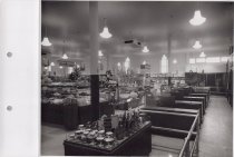 Black and white photograph of sales floor