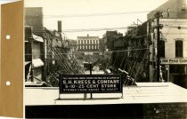Black and white photograph of rear view of wall supports construction, take