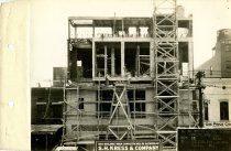 Black and white photograph of brickwork rear view during construction, take