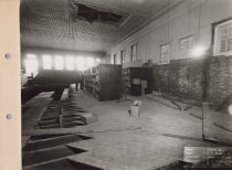 Black and white photograph of interior construction