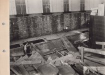 Black and white photograph of interior construction