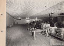 Black and white photograph of interior construction