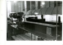 Black and white photograph of interior restaurant kitchen, received on Janu