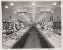 Black and white photograph of sales floor