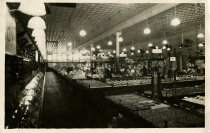 Black and white photograph print depicting the interior jewelry sales area,