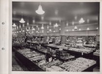 Black and white photograph of sales floor