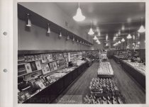 Black and white photograph of sales floor