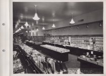 Black and white photograph of sales floor