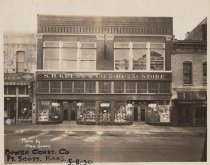 Black and white photograph of the main entrance to the Kress store. Photo s