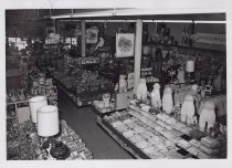 Black and white photograph of Kress store sales floor, photo shows clothing