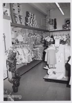 Black and White photograph of Kress store girls clothing section.