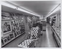 Black and white photograph of homrgoods highligting the opening sale.