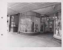 Black and white photograph of Kress store display windows empty/
