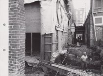 Black and white photograph of Kress side alley under construction