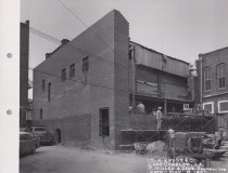Black and white photograph of Kress side alley under construction