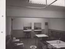 Black and white photograph of Kress breakroom featuring chairs and tables