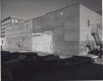 Black and white photograph of Kress store side lot