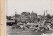 Black and white photograph of Kress construction site while the frame was b