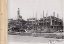 Black and white photograph of Kress construction site while the frame was b