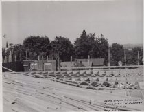 Black and white photograph of Kress rooftop under construction