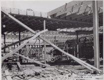 Black and white photograph of Kress construction site during framing