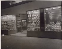 Black and white photograph of Kress display windows featuring childrens toy